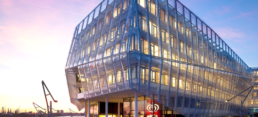 Unilever building from the front right at sunset